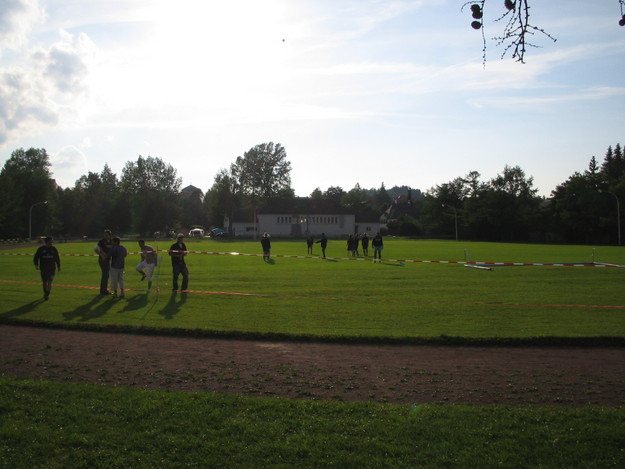 The 2nd half team warm up on pitch next door