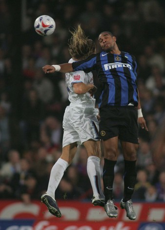 Darren Ward jumps with Adriano