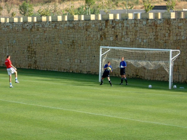 Alex Kolinko and Matt Gregg perform drill exercises before the match
