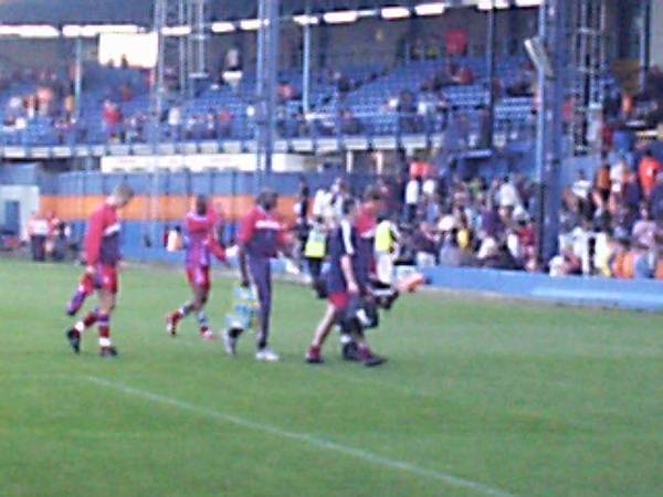Palace subs and trainers head towards the tunnel