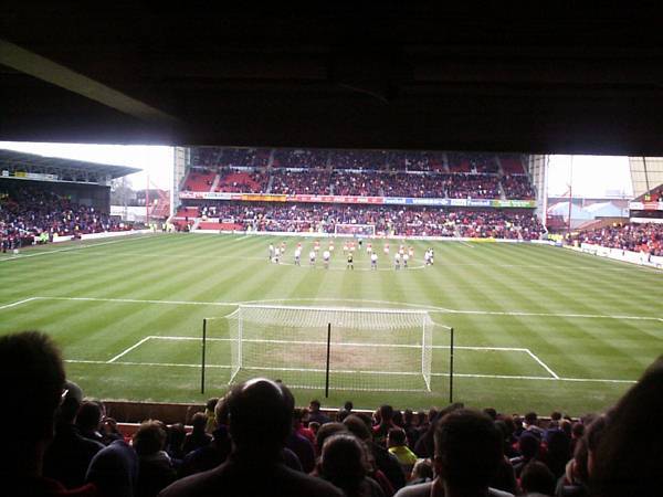 Players lineup for a one minute silence