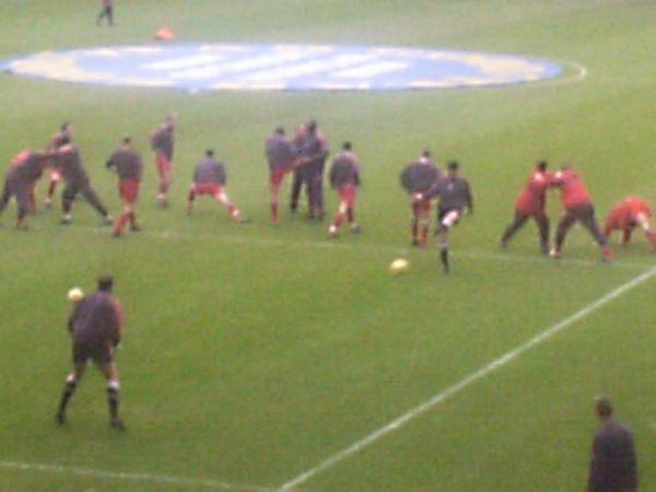 Palace players warmup before the start of the match