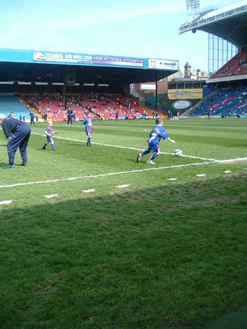 mascots enjoying a pre match kickabout