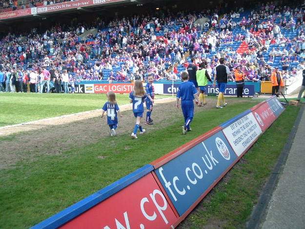 returning to get ready to lead the team out