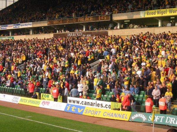 The Norwich fans watching the game
